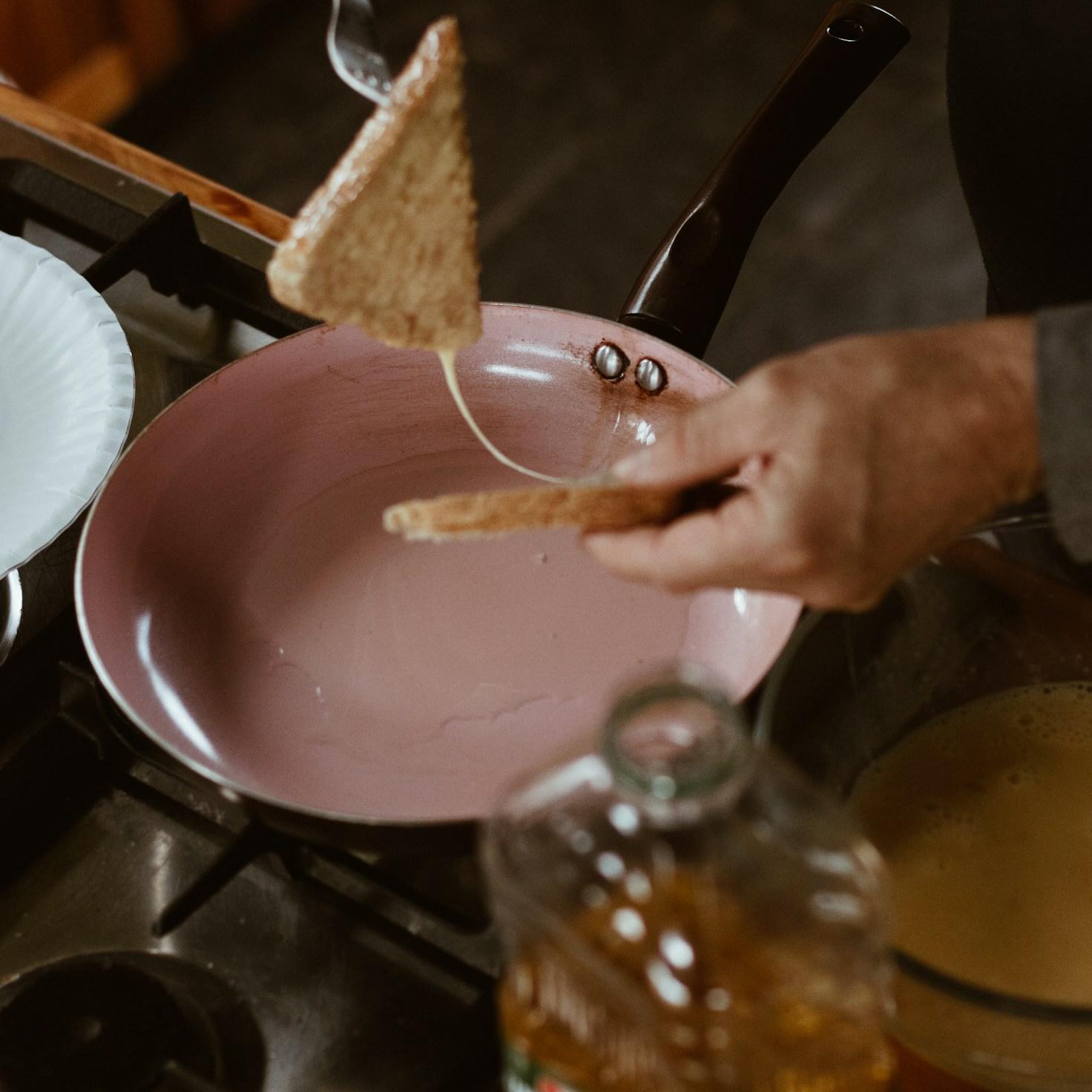 Community members collaborating in a modern kitchen space, sharing recipes and cooking techniques
